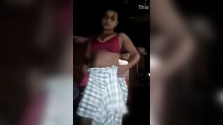 Young girl shows hairy pussy while changing the clothes