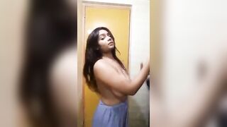 Busty woman shows boobs and pussy in a hotel room